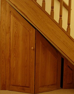 oak staircase and storage
